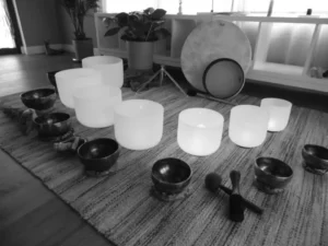 A table with bowls and cups on it